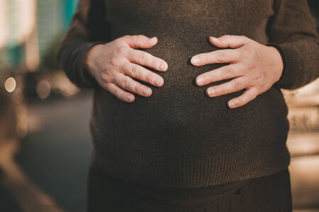 Closeup shoot of the belly of pregnant womanの写真素材