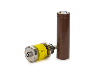 Vaping parts. Atomizer with brown battery. Isolated over white background.の写真素材