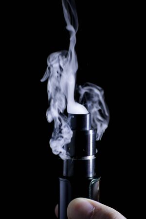 E-cigarette vape. Isolated against black background.