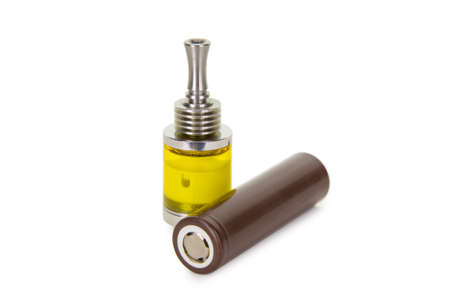 Vaping parts. Atomizer with brown battery. Isolated over white background.