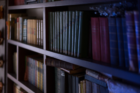 Books shelves at home library. Selective focus.の写真素材