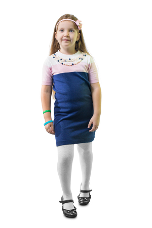 Schoolgirl in uniform against white background.の写真素材