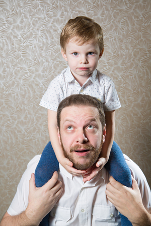 Portrait of caucasian man with his little sonの写真素材