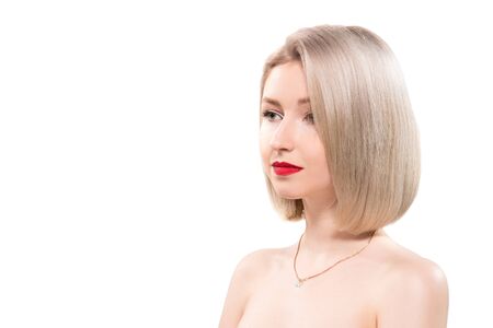 Portrait of beautiful female model on white backgroundの写真素材