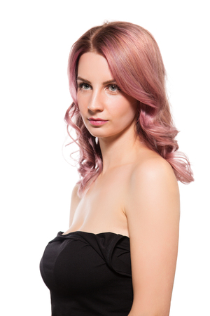 Portrait of beautiful female model on white backgroundの写真素材