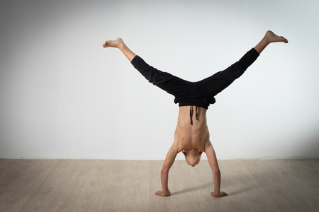 modern style dancer posing on studio backgroundの写真素材