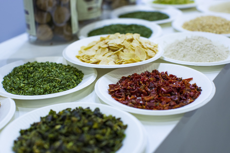 A picture of a composition of various dried fruits on a marketの写真素材
