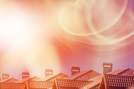 Roofs of houses and solar storm. The concept of geomagnetic weather.の写真素材