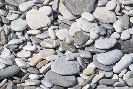 Gray pebbles on a beachの写真素材