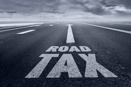 Desert road with text ROAD TAX Tonedの写真素材