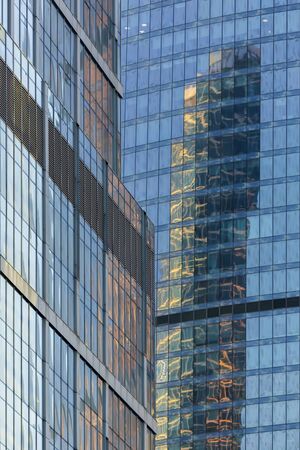 Buildings in a city creating impressive illusion Verticalの写真素材