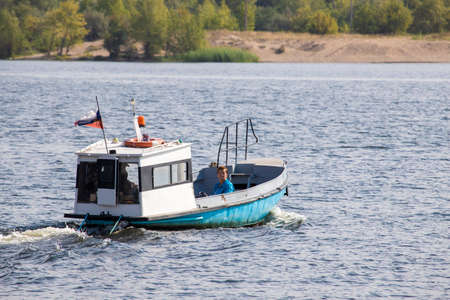 Saratov, Russia/August 28, 2020: Walking boats and ships on the Volga River near Saratov.のeditorial素材