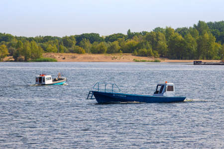 Saratov, Russia/August 28, 2020: Walking boats and ships on the Volga River near Saratov.のeditorial素材