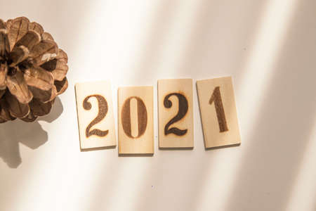 2021 year concept. Wooden Blocks With text on table. High quality photoの写真素材