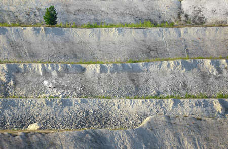 Old open-cast mine. Industrial extraction of chalk and by mining. Lake in quarry. Aerial. High quality photoの写真素材