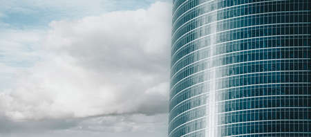 Architecture background of fragment of modern office building with blue glazing of facade. High quality photoの写真素材