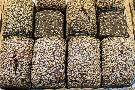 Bakery - gold rustic crusty loaves of bread and buns. High quality photoの写真素材