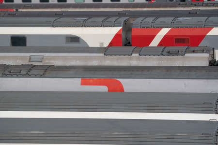 Moscow, Russia - March 26, 2021: Railway carriages in a row stand near the railway station Moskva-Passazhirskaya in the city of Moscow. High quality photoのeditorial素材