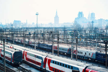 Moscow, Russia - March 26, 2021: Railway carriages in a row stand near the railway station Moskva-Passazhirskaya in the city of Moscow. High quality photoのeditorial素材