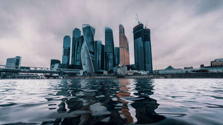 Moscow, Russia - November 19, 2021: Heights in the fog. Buildings of the business center Moscow City in a cityscape. High quality photoのeditorial素材
