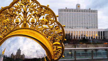 Moscow, Russia - February 21, 2021: A fragment of the national Russian womens headdress is a kokoshnik. White House - The Government of the Russian Federation in defocus.のeditorial素材