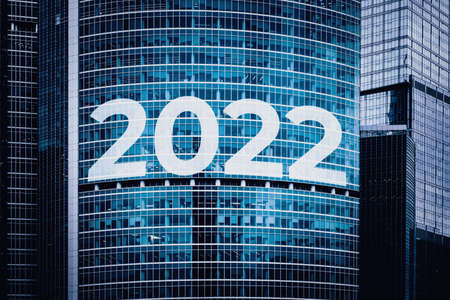 2022 white text on a facade a modern building. High quality photo