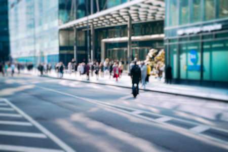 People silhouettes at office building Blurred. High quality photo