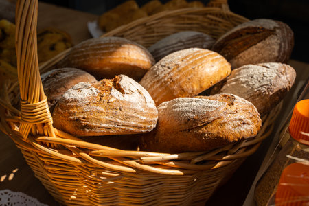 Basket of fresh bread. Freshly baked bread in different shapes. High quality photoの写真素材