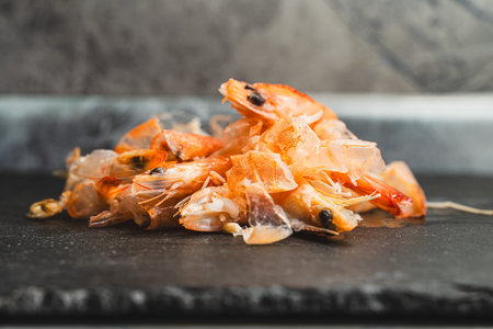 Mica board of food waste with clams, shrimp, dirty dishes. selected focus. High quality photoの写真素材