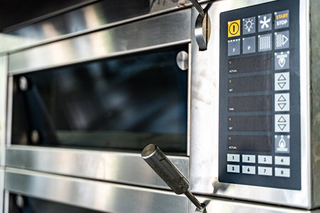 A combi-steamer or a large production oven for baking pizza and other products and products. High quality photoの写真素材