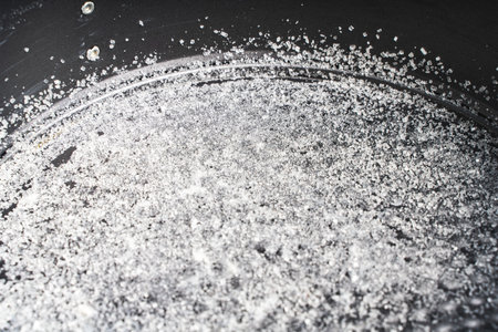 Baking pan in sugar. Confectionery background. Close-up. High quality photoの写真素材