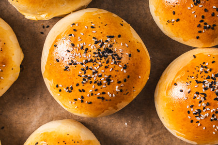 Fresh sesame burger buns. View from above. Close-up. High quality photoの写真素材