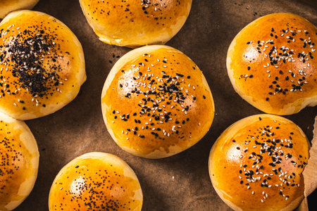 Fresh sesame burger buns. View from above. Close-up. High quality photoの写真素材