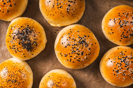 Fresh sesame burger buns. View from above. Close-up. High quality photoの写真素材