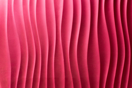Abstract curve of pink wavy vertical lines, background. Fashionable pink stripes texture design. Can be used for cover, poster, banner network, flyer, print advertisement. Abstract texture of wavy scene pattern. A collection of luxurious soft layers of striped background. High quality photoの写真素材