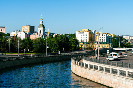 Moscow, Russia - May 23, 2024: Kotelnicheskaya Embankment, Moskva River, view of the river and the church from the bridge. Selected focus. High quality photoの写真素材