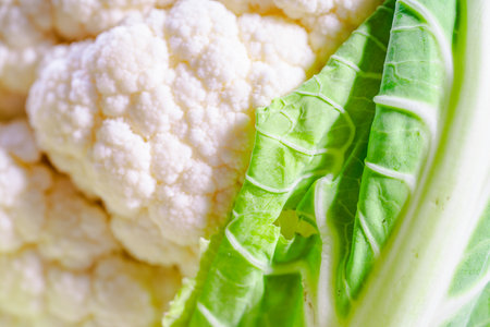 Cauliflower close-up. Background with cabbage texture. Food background. Macro photography. High quality photoの写真素材