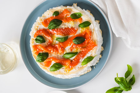 Omelette Poulard. Omelette of Mother Poulard. French omelette with whipped egg whites, lightly salted trout and basil. Beautiful, healthy and tasty breakfast. Top view. Copyspace. High quality photoの写真素材