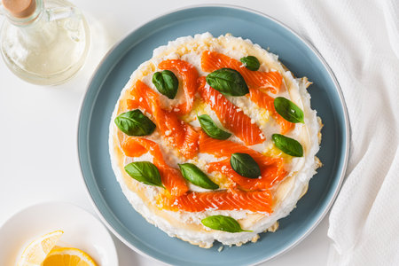 Omelette Poulard. Omelette of Mother Poulard. French omelette with whipped egg whites, lightly salted trout and basil. Beautiful, healthy and tasty breakfast. Top view. Copyspace. High quality photoの写真素材