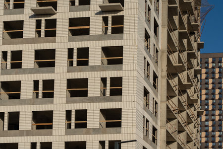 Construction of multi-storey residential buildings. Skyscrapers for housing. High quality photoの写真素材