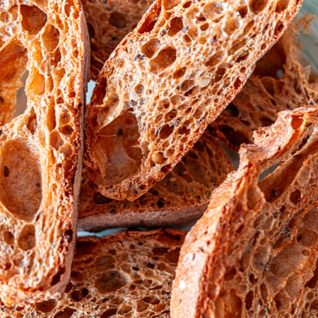 Close-up of slices of bread. Macro photography of bread texture. Background. Use for banner or menu, copyspace. High quality photoの写真素材