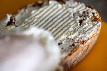 Bread toast is smeared with cottage cheese cream. Close-up. High quality photoの写真素材