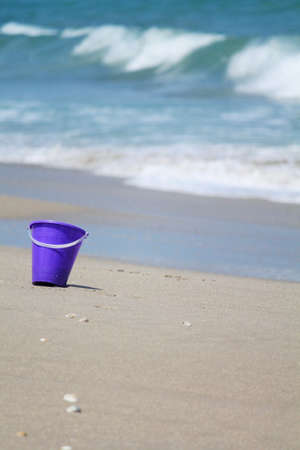 Purple Pail on Beach