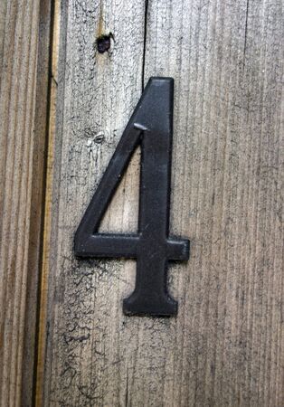 Written Wording in Distressed State Typography Found Number Four 4