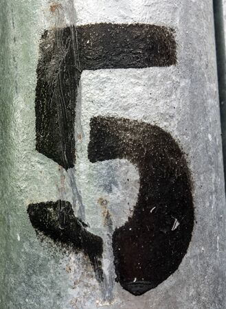 Written Wording in Distressed State Typography Found Number Five 5