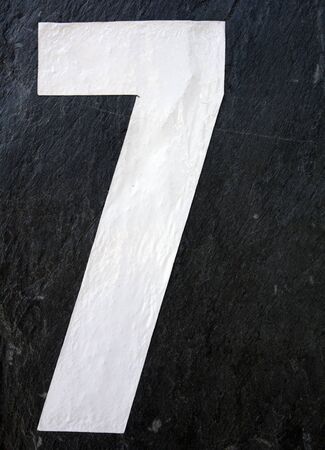 Written Wording in Distressed State Typography Found Number Seven 7