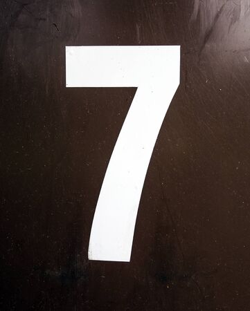Written Wording in Distressed State Typography Found Number Seven 7
