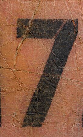 Written Wording in Distressed State Typography Found Number Seven 7