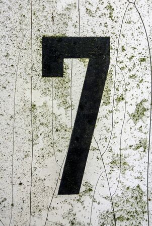 Written Wording in Distressed State Typography Found Number Seven 7