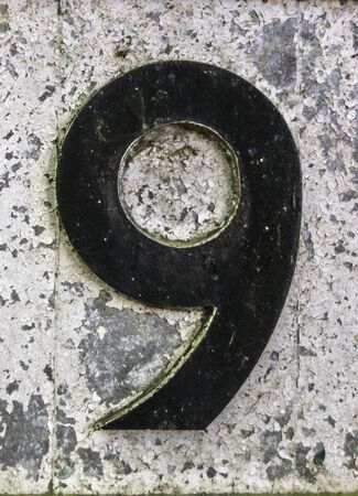 Written Wording in Distressed State Typography Found Number Nine 9